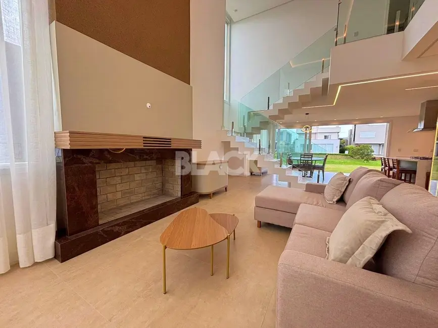 Foto 7 de Casa de Condomínio com 4 quartos à venda, 310m2 em Torres - RS