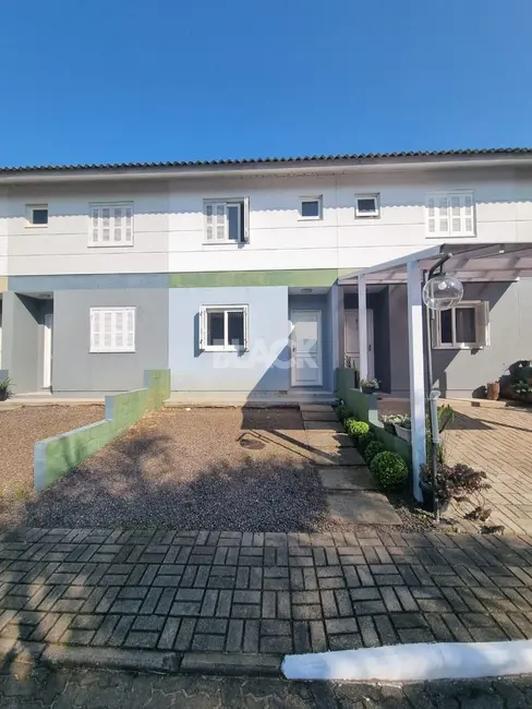 Foto 1 de Casa com 3 quartos à venda, 79m2 em Torres - RS