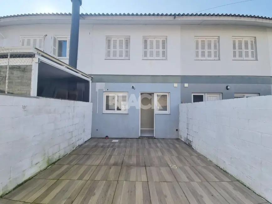 Foto 2 de Casa com 3 quartos à venda, 79m2 em Torres - RS