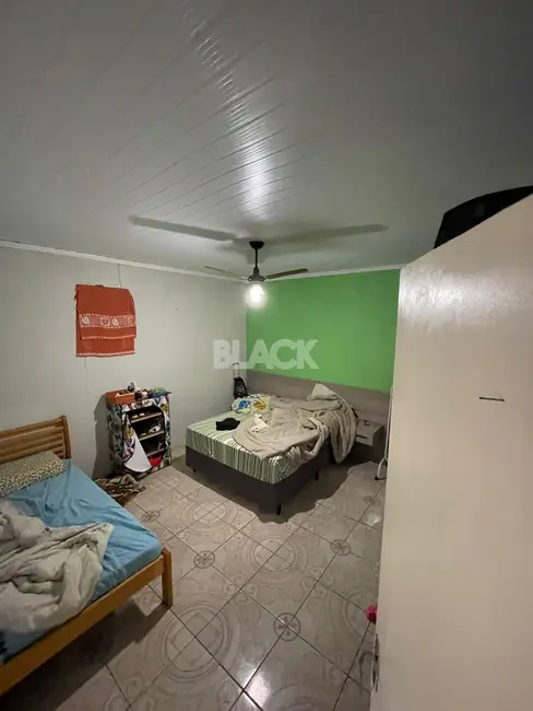 Foto 8 de Casa com 2 quartos à venda, 100m2 em Torres - RS