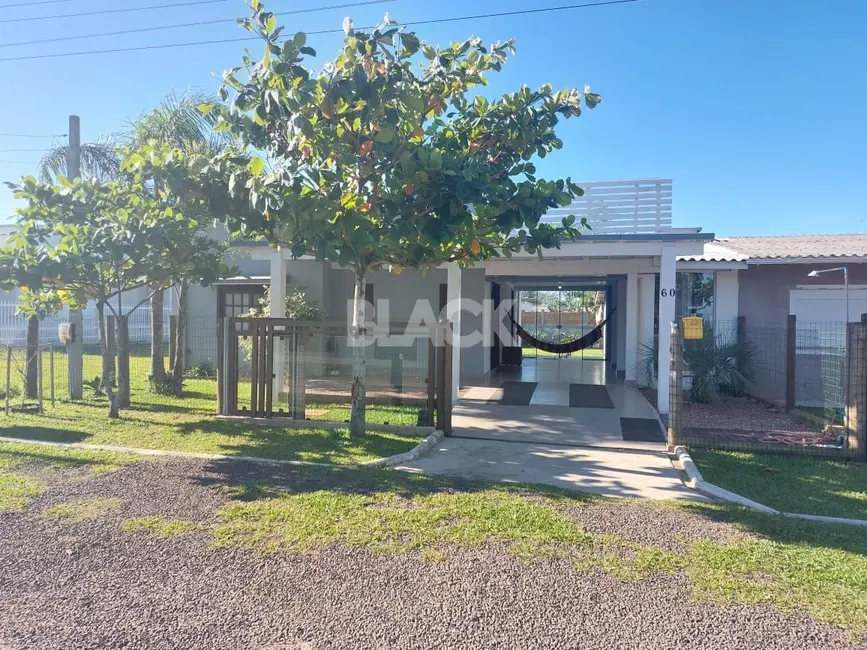 Foto 1 de Casa com 2 quartos à venda, 130m2 em Torres - RS