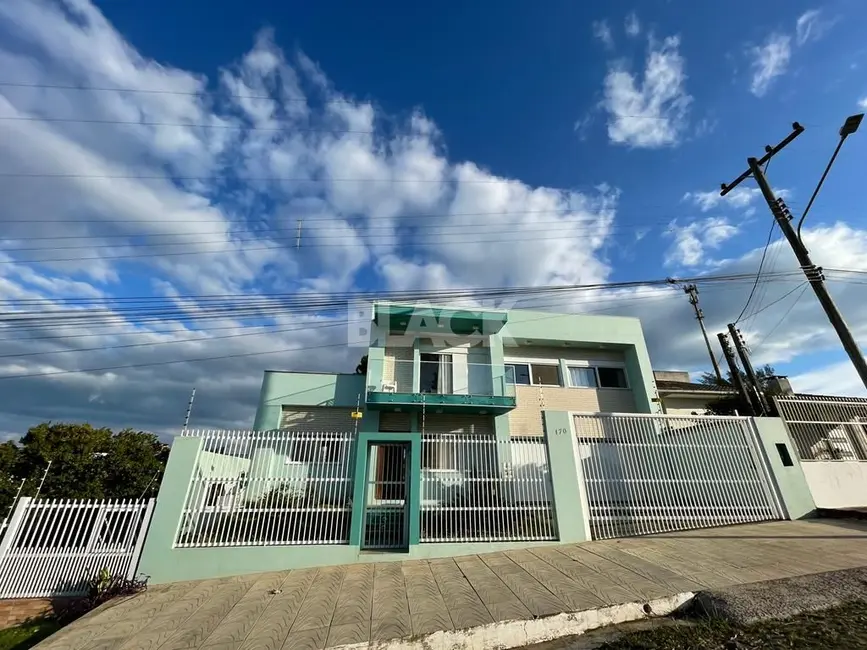 Casa com 4 quartos à venda, 320m2 em Torres - RS - imagem 1 Foto 1 de Casa com 4 quartos à venda, 320m2 em Torres - RS