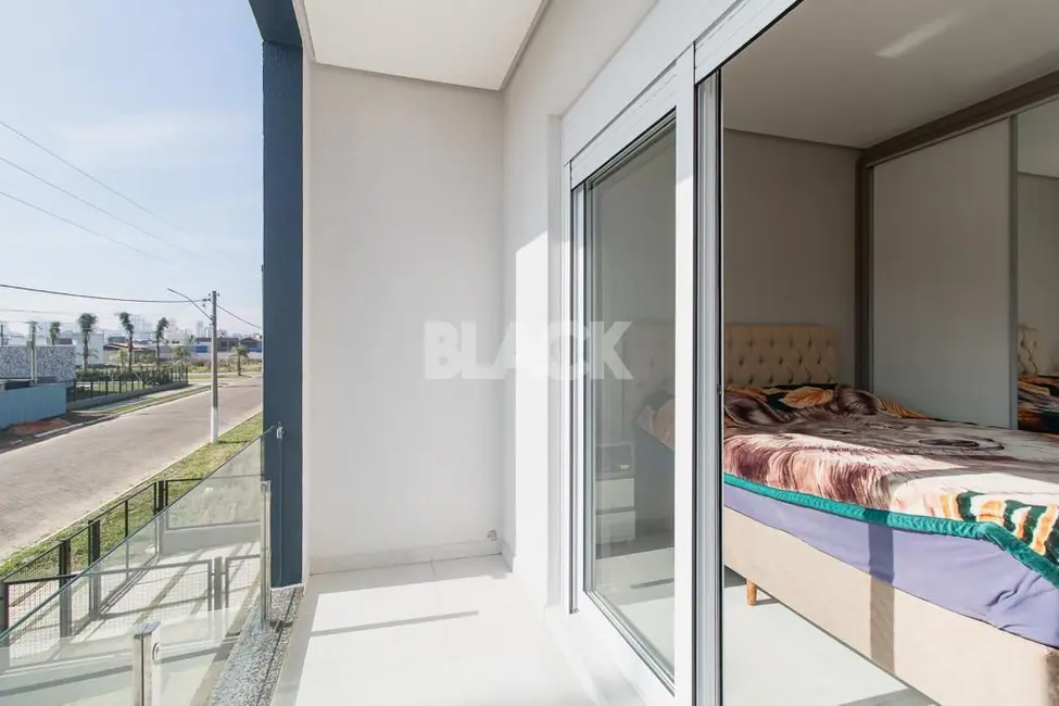 Sobrado com 2 quartos à venda, 96m2 em Torres - RS - imagem 9 Foto 9 de Sobrado com 2 quartos à venda, 96m2 em Torres - RS
