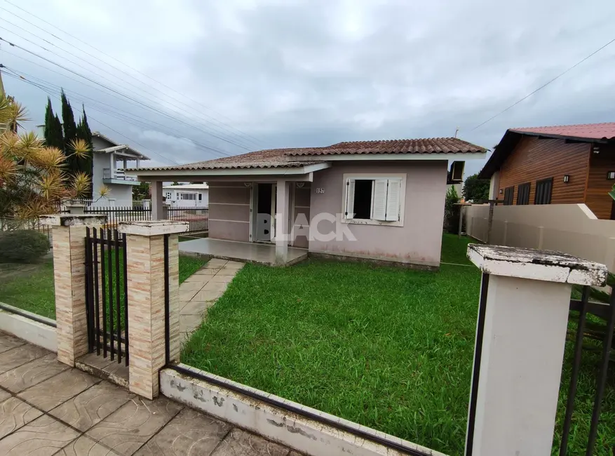Foto 1 de Casa com 2 quartos à venda, 100m2 em Torres - RS