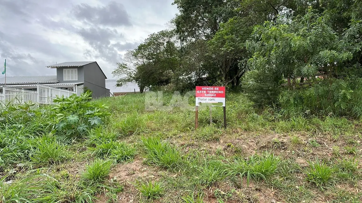 Foto 1 de Terreno / Lote à venda, 632m2 em Torres - RS