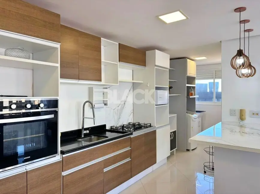 Foto 6 de Apartamento com 3 quartos à venda, 105m2 em Torres - RS
