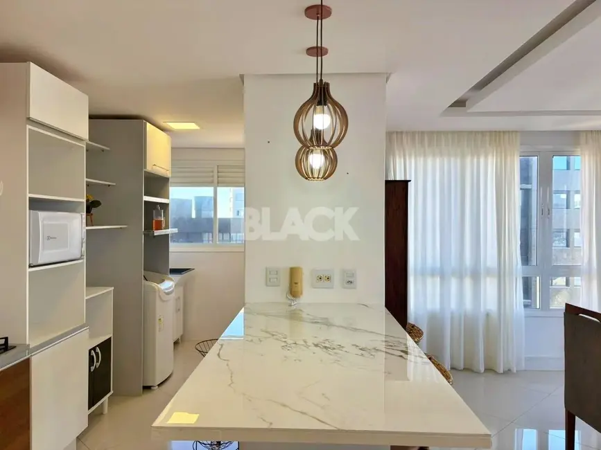 Foto 4 de Apartamento com 3 quartos à venda, 105m2 em Torres - RS
