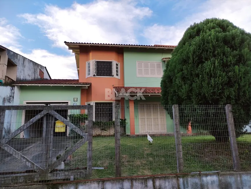 Foto 2 de Casa com 5 quartos à venda, 340m2 em Torres - RS