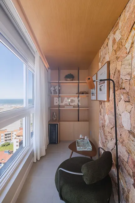 Foto 6 de Apartamento com 3 quartos à venda, 101m2 em Torres - RS