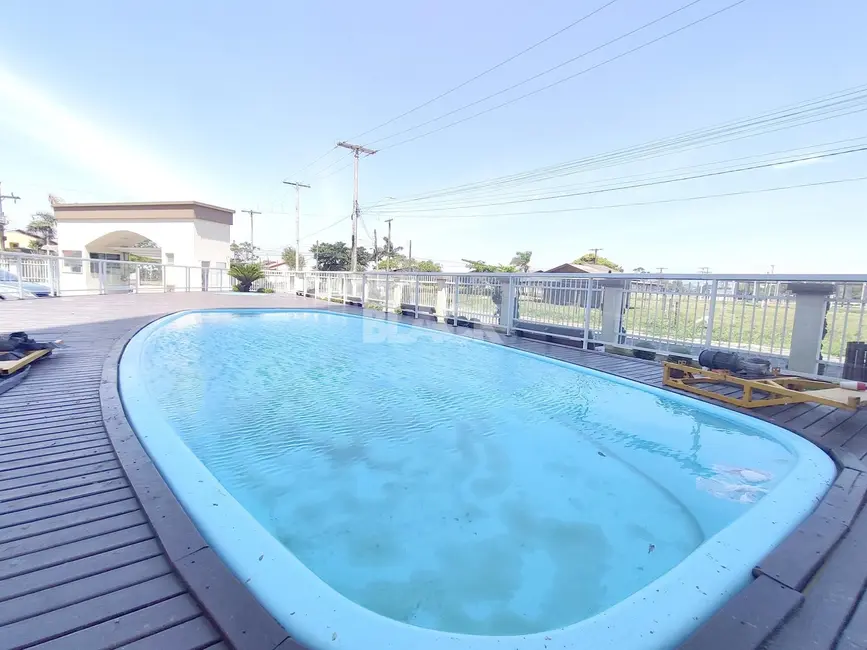 Foto 3 de Apartamento com 2 quartos à venda, 59m2 em Torres - RS