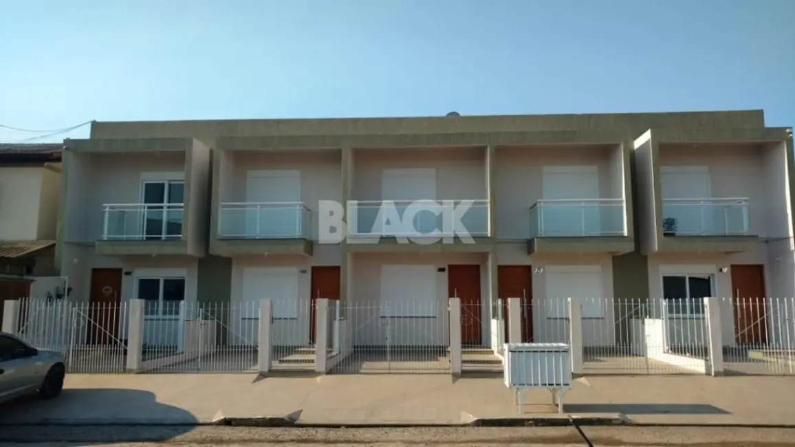 Foto 1 de Casa com 2 quartos à venda, 98m2 em Torres - RS