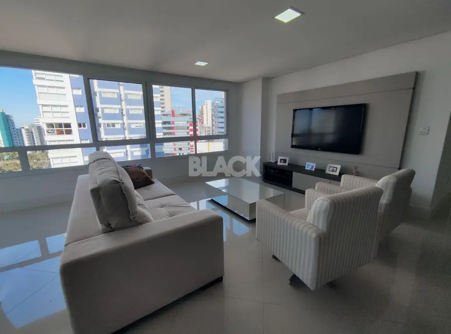 Foto 4 de Apartamento com 3 quartos à venda, 105m2 em Torres - RS