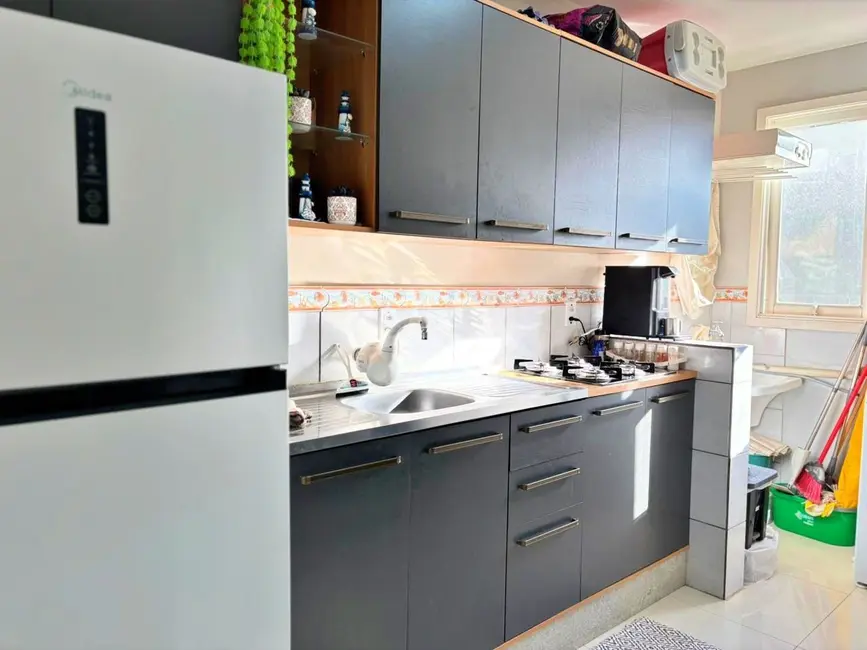 Foto 7 de Apartamento com 2 quartos à venda, 63m2 em Torres - RS