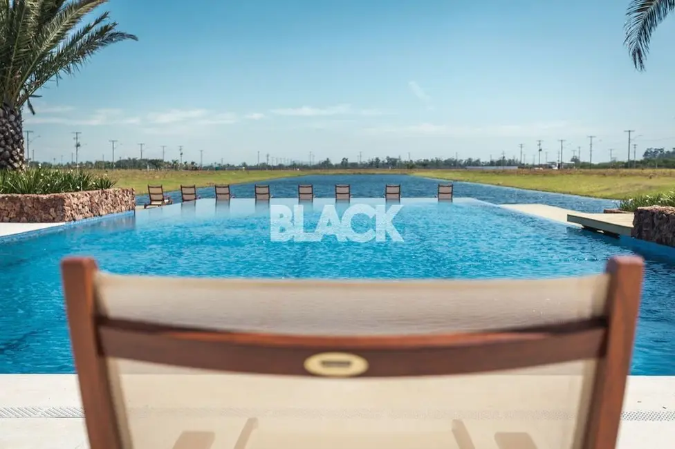 Foto 4 de Terreno / Lote à venda, 609m2 em Torres - RS