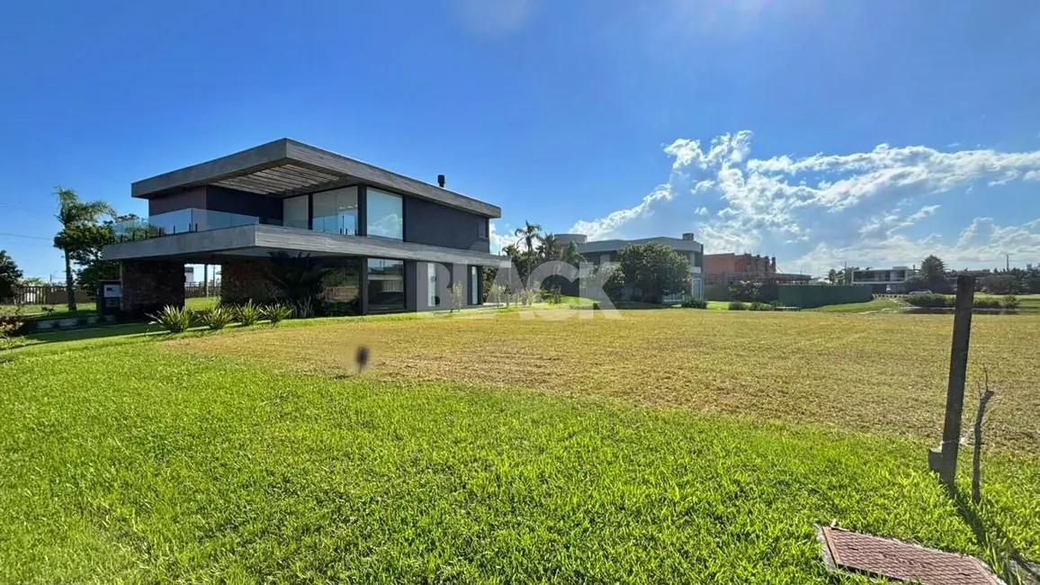 Foto 3 de Terreno / Lote à venda, 450m2 em Torres - RS