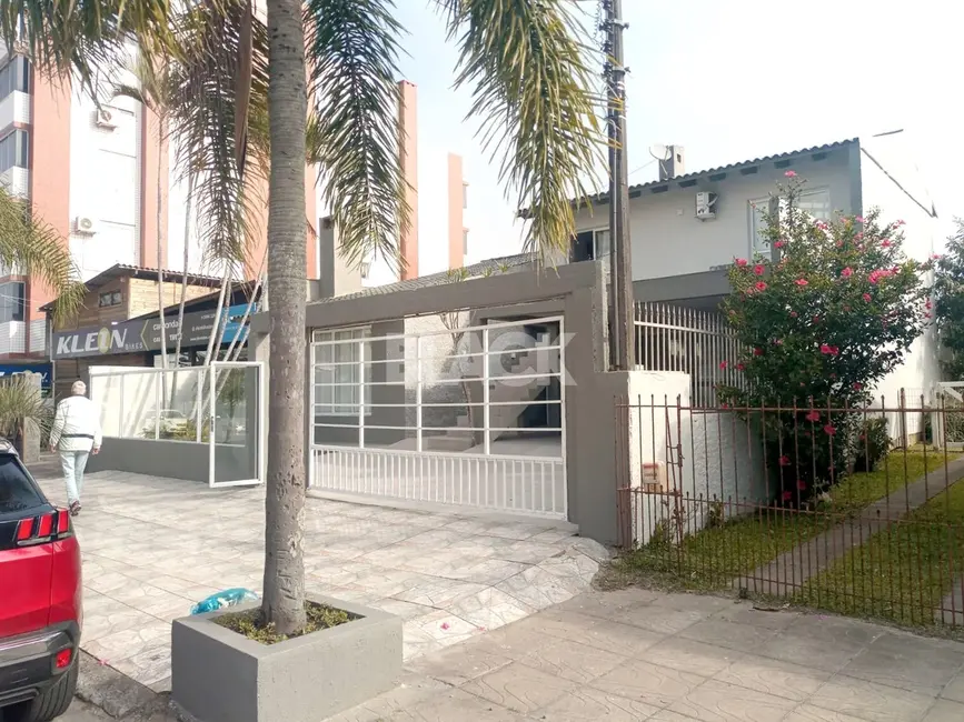Foto 2 de Casa com 5 quartos à venda, 350m2 em Centro, Torres - RS
