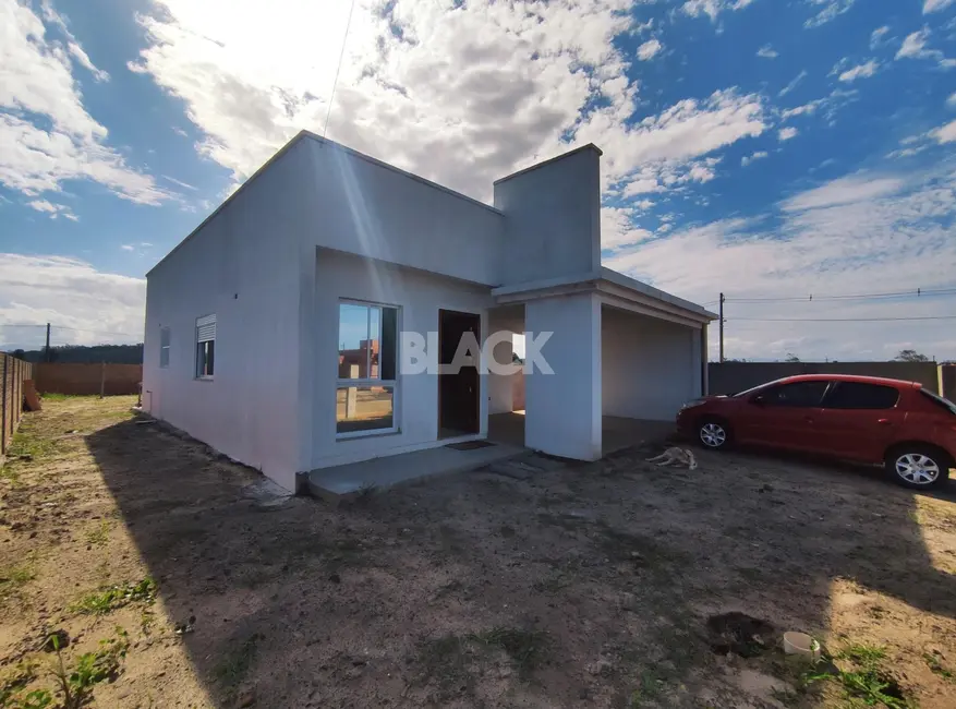 Casa com 2 quartos à venda, 106m2 em Torres - RS - imagem 1 Foto 1 de Casa com 2 quartos à venda, 106m2 em Torres - RS