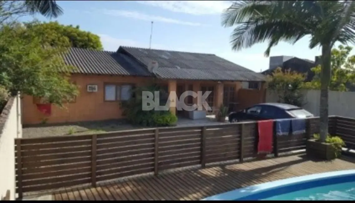 Foto 1 de Casa com 3 quartos à venda, 160m2 em Torres - RS