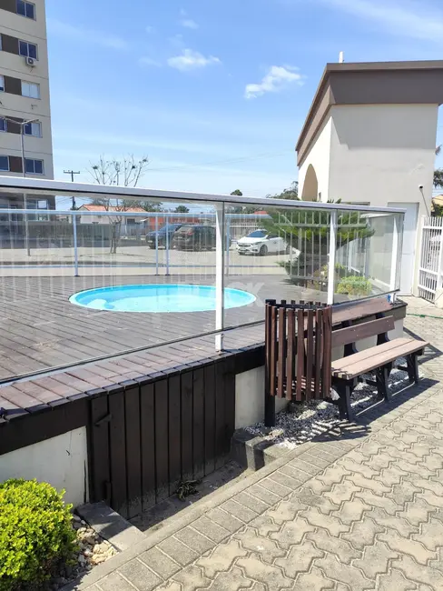 Foto 4 de Apartamento com 2 quartos à venda, 59m2 em Torres - RS