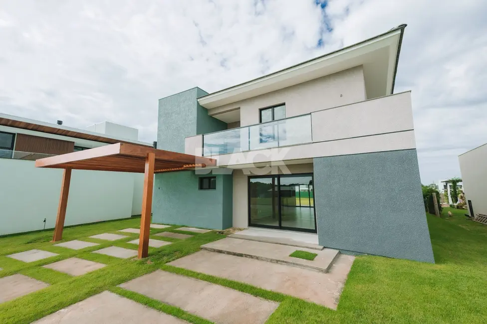 Foto 1 de Casa de Condomínio com 4 quartos à venda, 256m2 em Torres - RS