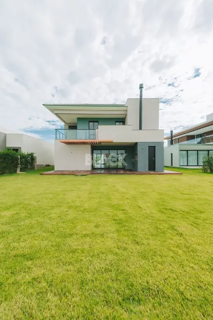 Foto 3 de Casa de Condomínio com 4 quartos à venda, 256m2 em Torres - RS