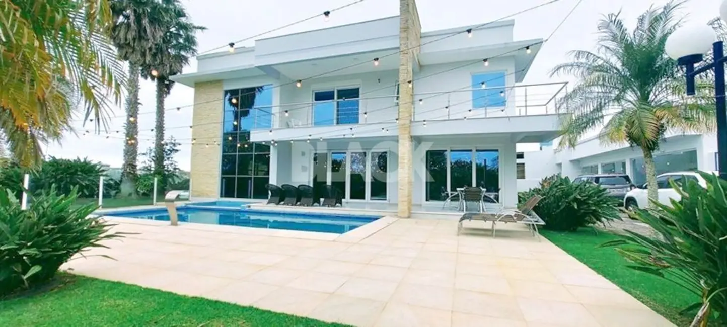 Foto 1 de Casa com 4 quartos à venda, 615m2 em Torres - RS