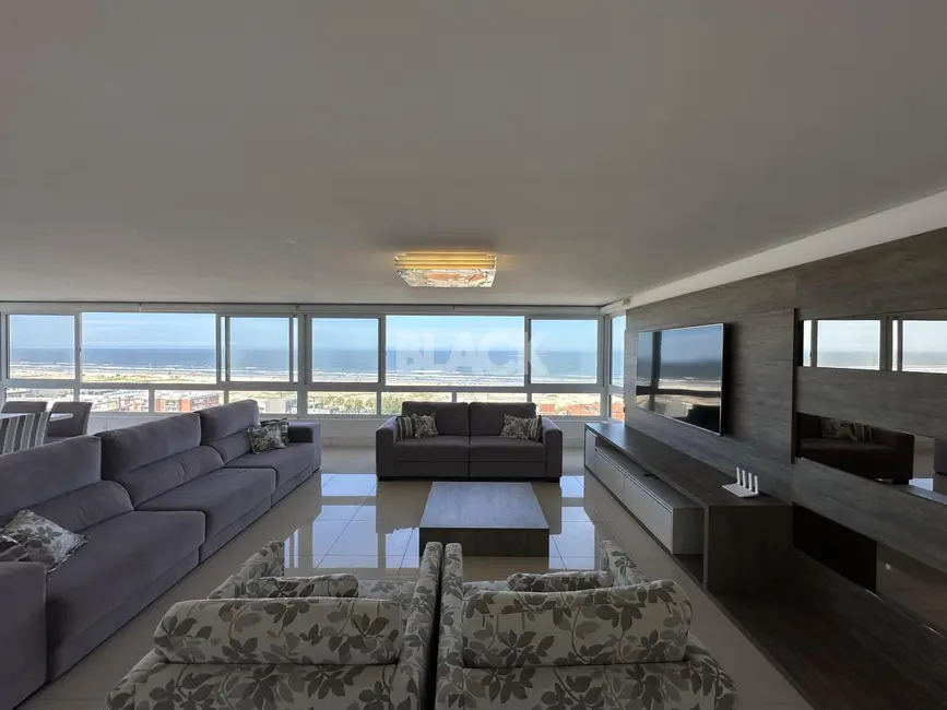 Foto 1 de Apartamento com 4 quartos para alugar, 241m2 em Torres - RS