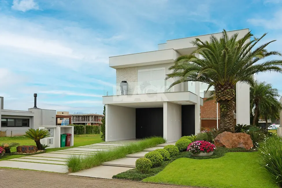 Foto 1 de Casa de Condomínio com 4 quartos à venda, 431m2 em Torres - RS