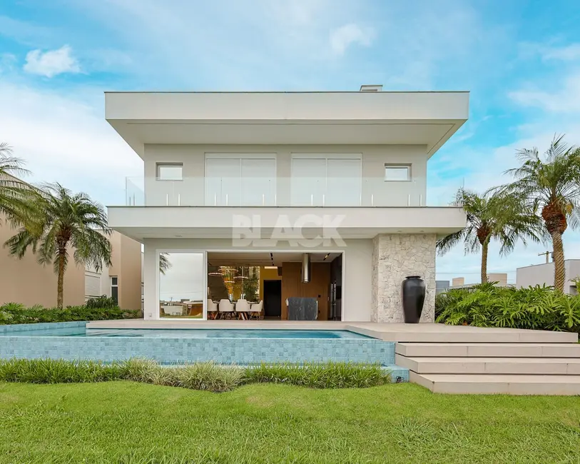 Foto 1 de Casa de Condomínio com 4 quartos à venda, 431m2 em Torres - RS