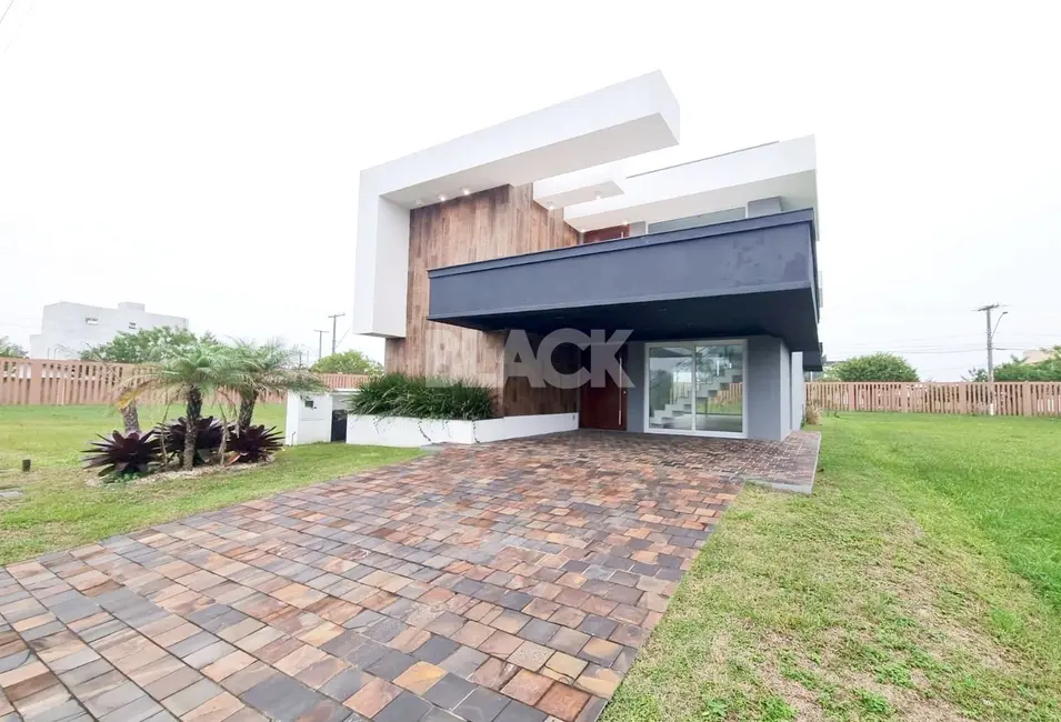 Foto 1 de Casa de Condomínio com 5 quartos à venda, 295m2 em Torres - RS