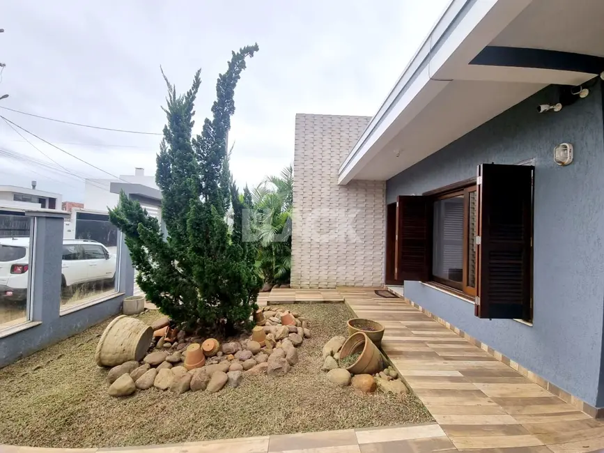 Foto 2 de Casa com 3 quartos à venda, 190m2 em Torres - RS