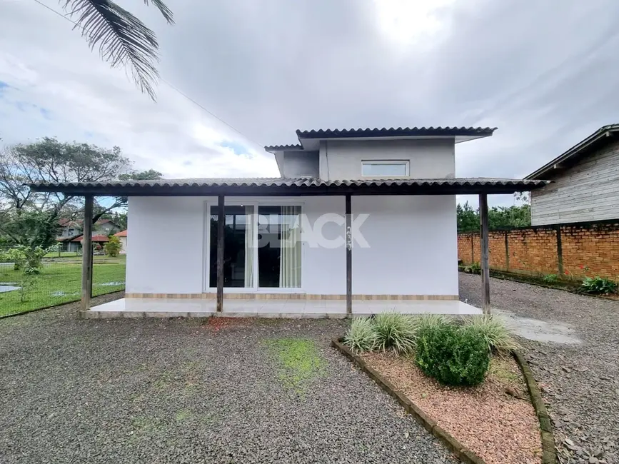 Foto 1 de Casa com 3 quartos à venda, 140m2 em Torres - RS