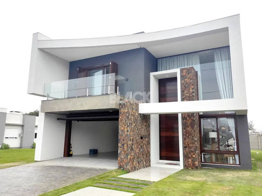 Casa de Condomínio com 4 quartos à venda, 310m2 em Torres - RS - imagem 1 Foto 1 de Casa de Condomínio com 4 quartos à venda, 310m2 em Torres - RS