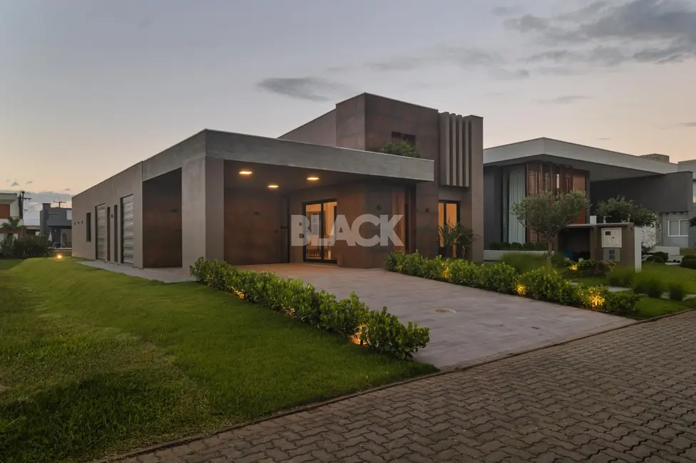 Foto 1 de Casa de Condomínio com 3 quartos à venda, 193m2 em Torres - RS