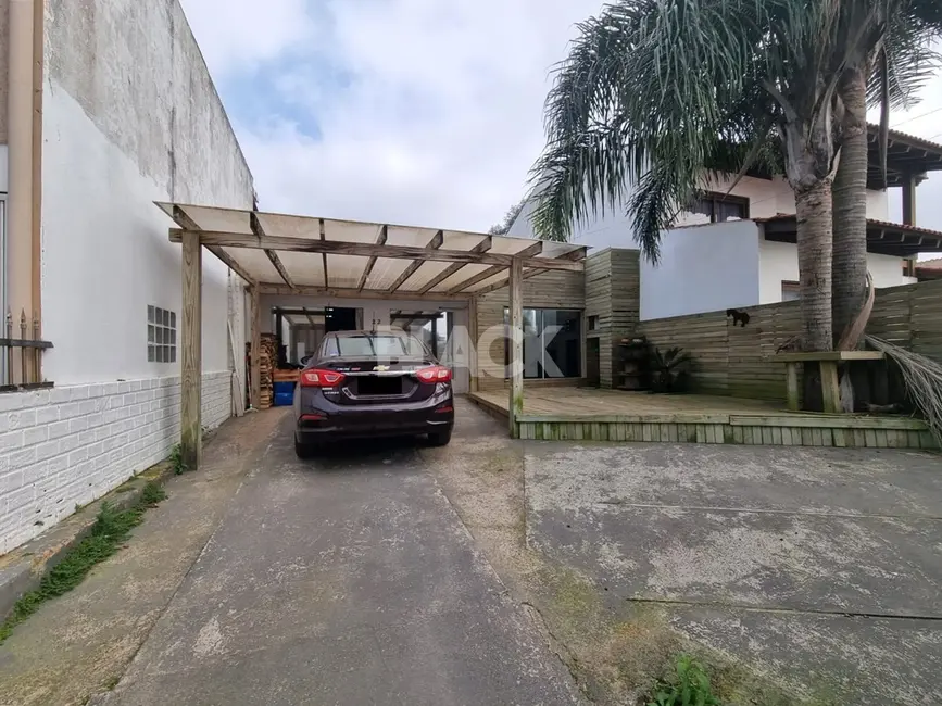 Foto 1 de Casa com 3 quartos à venda, 130m2 em Centro, Torres - RS