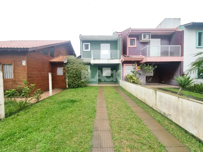 Foto 1 de Casa com 3 quartos à venda, 116m2 em Torres - RS