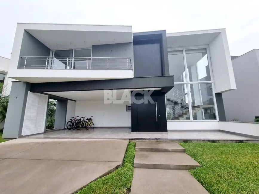 Casa de Condomínio com 5 quartos à venda, 357m2 em Torres - RS - imagem 1 Foto 1 de Casa de Condomínio com 5 quartos à venda, 357m2 em Torres - RS