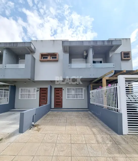 Foto 1 de Casa com 2 quartos à venda, 77m2 em Torres - RS