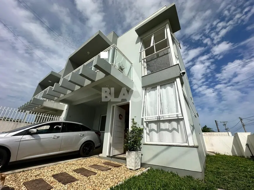 Foto 1 de Casa com 3 quartos à venda, 100m2 em Torres - RS