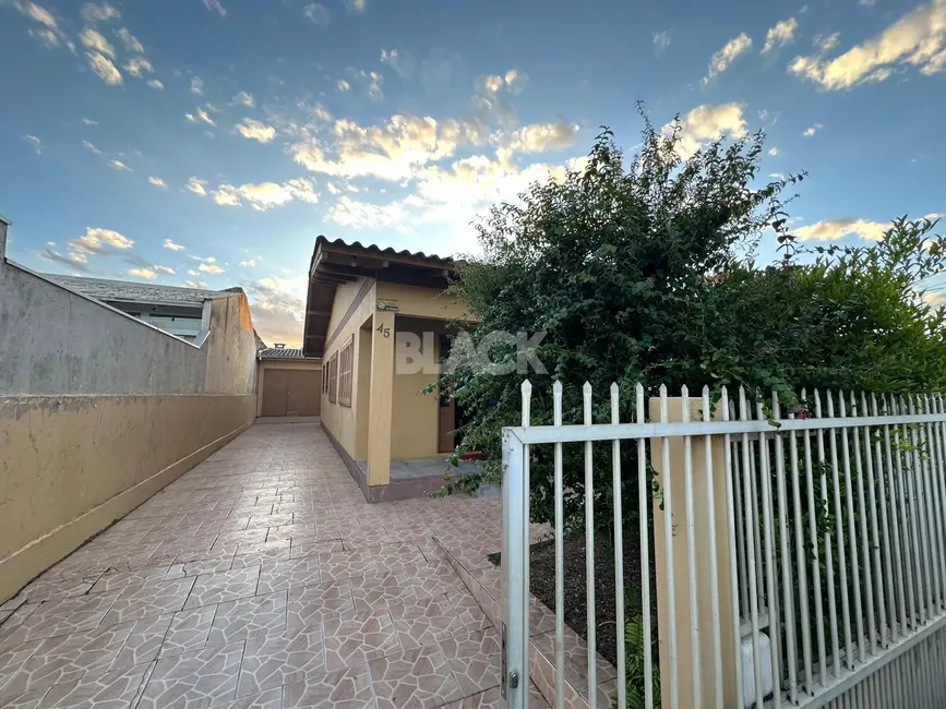 Foto 1 de Casa com 3 quartos à venda, 102m2 em Torres - RS