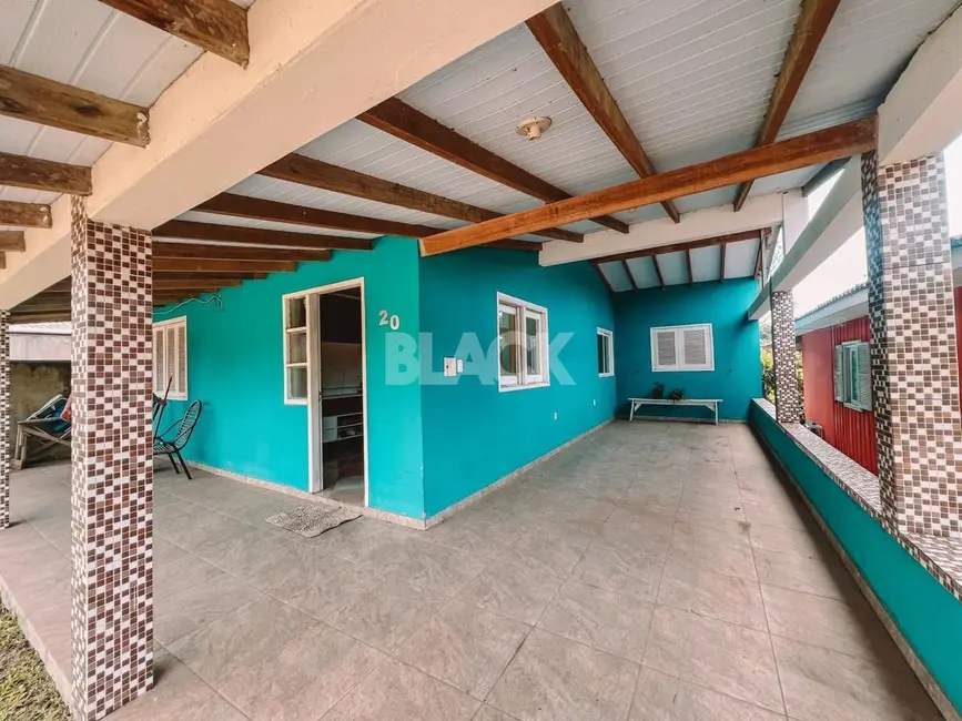 Casa com 2 quartos à venda, 90m2 em Torres - RS - imagem 1 Foto 1 de Casa com 2 quartos à venda, 90m2 em Torres - RS