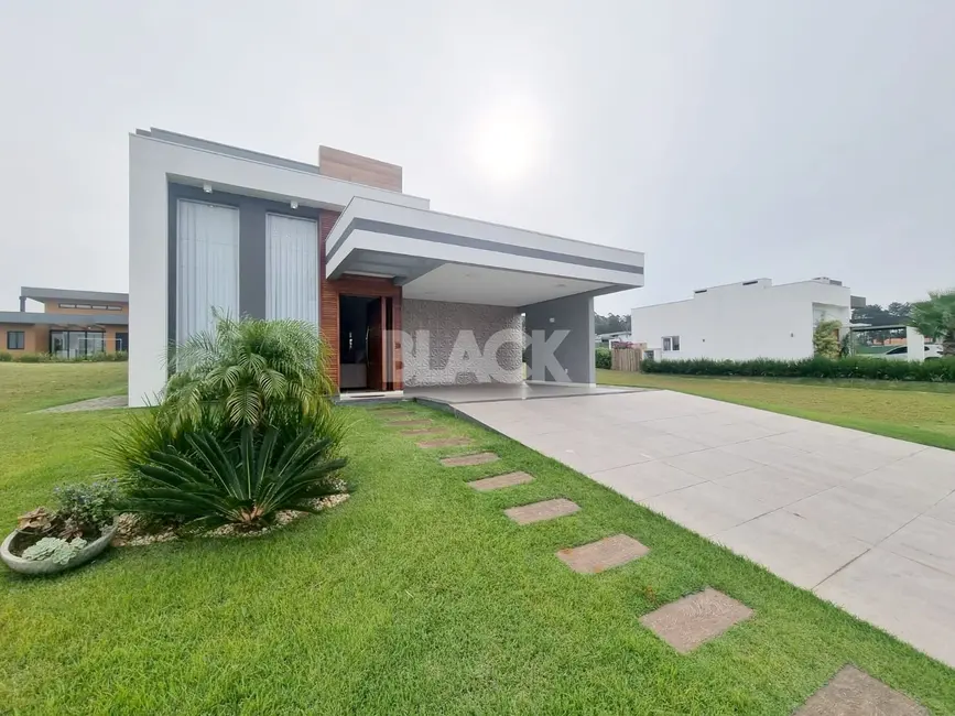 Casa de Condomínio com 3 quartos à venda, 152m2 em Torres - RS - imagem 1 Foto 1 de Casa de Condomínio com 3 quartos à venda, 152m2 em Torres - RS