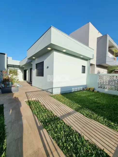 Foto 2 de Casa com 3 quartos à venda, 110m2 em Torres - RS
