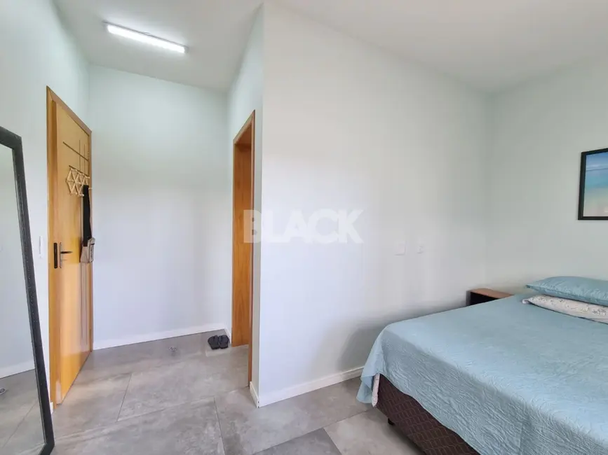Casa com 3 quartos à venda, 110m2 em Torres - RS - imagem 9 Foto 9 de Casa com 3 quartos à venda, 110m2 em Torres - RS