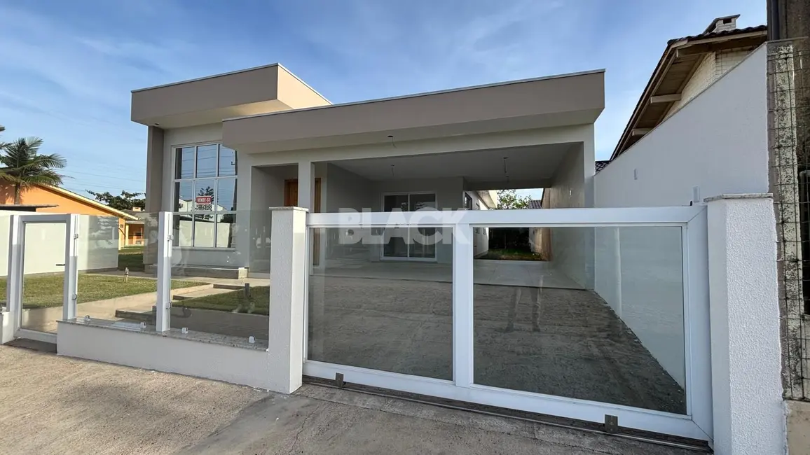 Foto 1 de Casa com 3 quartos à venda, 135m2 em Torres - RS