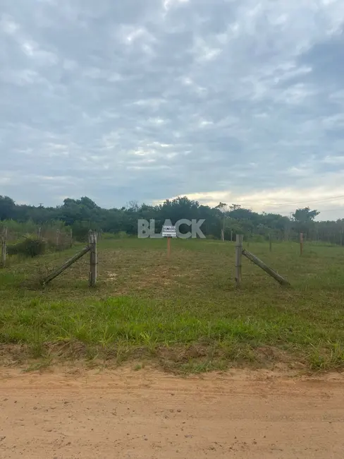 Foto 1 de Terreno / Lote à venda, 312m2 em Torres - RS
