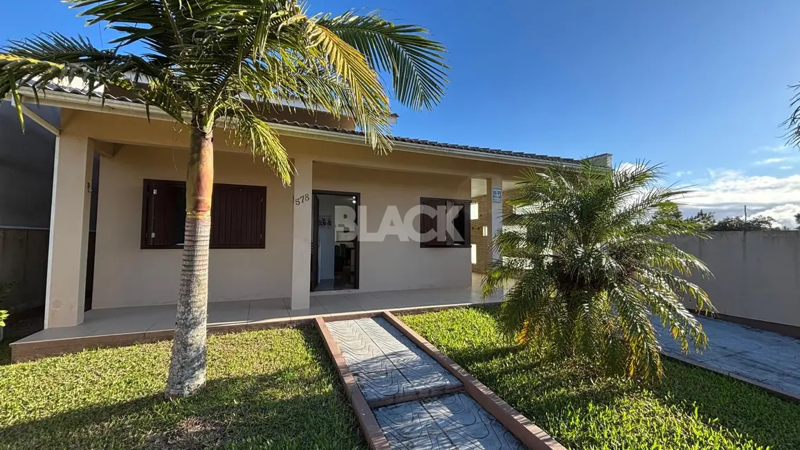 Foto 1 de Casa com 3 quartos à venda, 167m2 em Torres - RS
