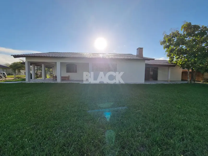 Foto 6 de Casa com 6 quartos à venda, 264m2 em Torres - RS