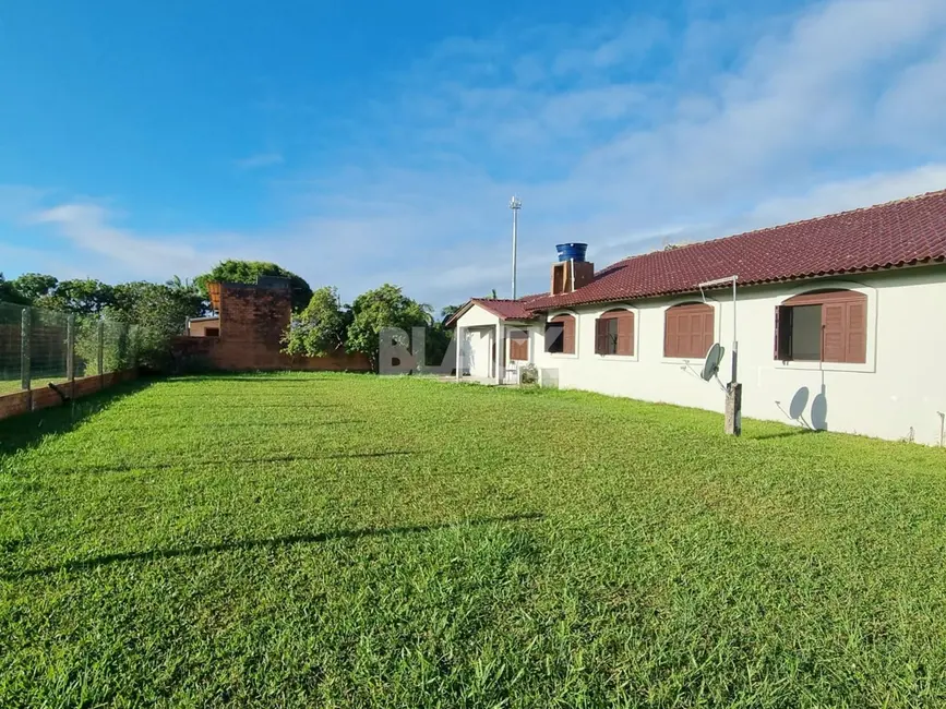 Foto 5 de Casa com 6 quartos à venda, 264m2 em Torres - RS