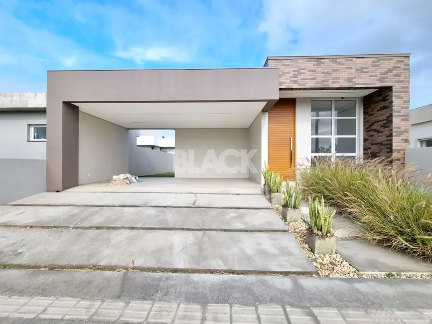 Foto 2 de Casa com 3 quartos à venda, 130m2 em Passo De Torres - SC